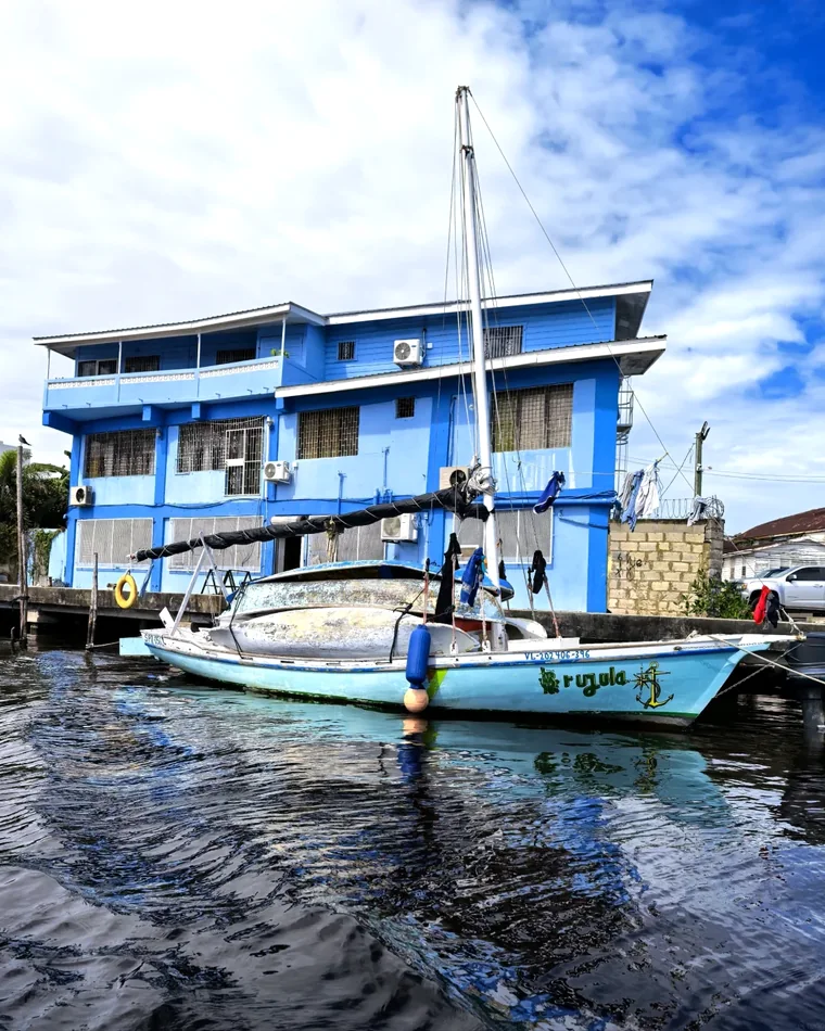 Local boat moored along the waterfront in San Pedro, Belize